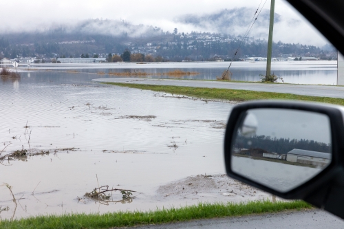 Fraser Velley Flooding as Seen through the Open Window of a Car