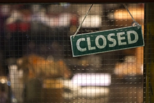 Closed Sign in Store Window
