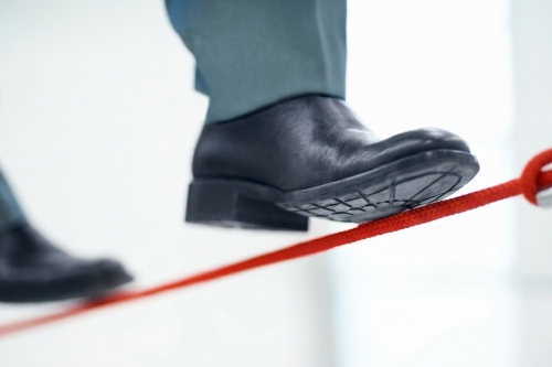 Understanding Moral Hazards and Liability Exposures - Foot on a Tightrope
